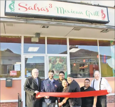  ?? Contribute­d photo ?? Salsa’s 3 Mexican Grill held a grand opening Feb. 4 at 120 Washington St., Middletown. From left are Middlesex County Chamber of Commerce President Larry McHugh, Mayor Dan Drew, Salsa’s 3 Owners Jose Melchor, Maria Lopez and Leon Lopez, Irais Melchor and Chamber Chairman Jay Polke.