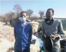  ?? ZELDA VENTER ?? WASTE pickers Justice Shabangu and George Mphotshe are back at their Mushroomvi­lle ‘home’ after being arrested in April for breaking lockdown rules. |