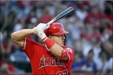  ?? MARK J. TERRILL — THE ASSOCIATED PRESS FILE ?? Angels’ outfielder Mike Trout waits for a pitch during a game against the Orioles in Anaheim, Calif., last year.