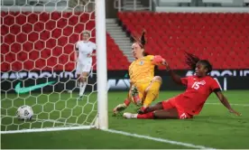  ?? Photograph: Carl Recine/Action Images/Reuters ?? Canada’s Nichelle Prince scores their second goal in the 86th minute, past England’s Karen Bardsley.