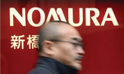  ?? Photograph: Toru Yamanaka/AFP/Getty Images ?? Nomura is now the second-hardest-hit lender as a result of the failure of Archegos Capital Management, behind Credit Suisse.