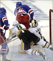  ?? AP ?? TOUGH CROWD: New York Rangers right wing Kaapo Kakko (24) collides with Pittsburgh Penguins goaltender Casey DeSmith in the third period of Game 1 of their firstround playoff series on Tuesday, in New York.