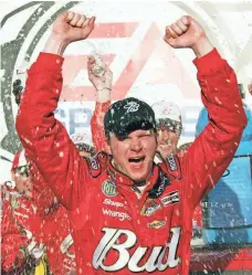  ?? TERRY RENNA, AP ?? Dale Earnhardt Jr. celebrates in victory lane at Talladega after winning the fall race in 2004, his fifth triumph at the track.