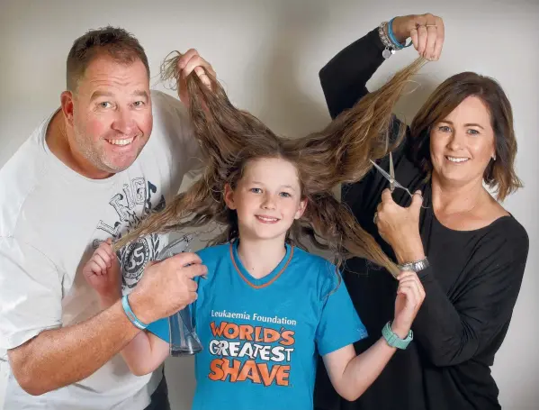  ?? Picture: GLENN FERGUSON ?? HAIR TODAY, GONE TOMORROW: Ella Parsons, 10, will have 25cm cut off the length of her hair by mum Jo to be turned into a wig for kids with cancer. She has been inspired by her dad Dave's cancer battle.