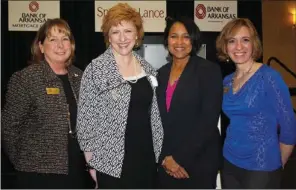  ??  ?? Judy Hammond, from left, and Mary Schneider, Single Parent Scholarshi­p Fund of Benton County board members, Rosalind Brewer, Sam’s Club president and chief executive, and Twyla Francis, scholarshi­p student, gather at the organizati­on’s Corporate...