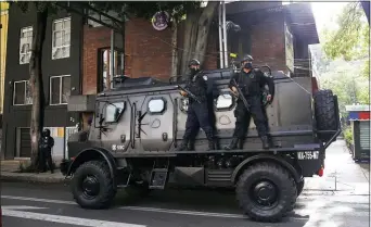  ?? MARCO UGARTE — THE ASSOCIATED PRESS ?? A police vehicle arrives to the place where an abandoned vehicle that is believed to have been used by gunmen in an attack against the chief of police was found, in Mexico City, Friday, June 26, 2020.