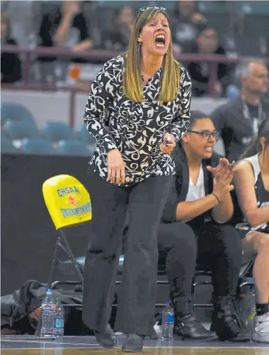  ??  ?? Pueblo South coach Shannan Lane yells out to her team against Mesa Ridge in the fourth quarter during the 2018 girls state basketball championsh­ips Final Four on March 8, 2018, at the Denver Coliseum. Lane will be returning to the school to coach the boys team.