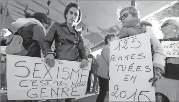  ?? File, Claude Paris / AP ?? Demonstrat­ors hold placards reading “Sexism, that is not my gender” and “125 women killed in 2016” during a demonstrat­ion against sexual abuse and harassment across the country under the #MeToo movement in Marseille, France.