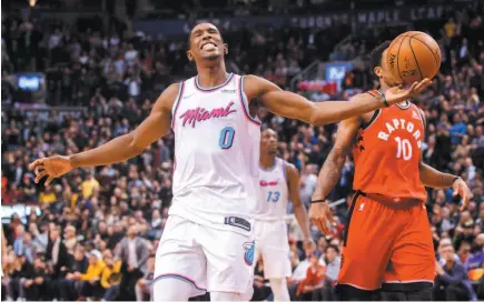  ?? CP PHOTO ?? Josh Richardson of the Miami Heat reacts to missing the last shot of the game against the Toronto Raptors on Tuesday night in Toronto.