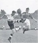  ??  ?? Roy Bentley (right) tackles Jim Taylor of Fulham during a West London derby in 1949