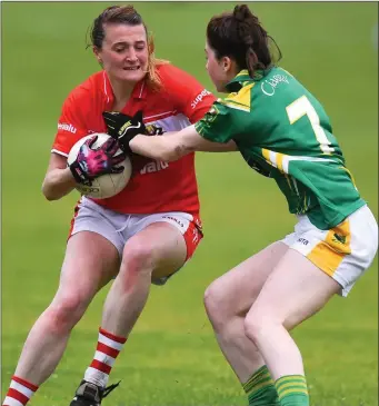  ??  ?? Annie Walsh, Cork , ischallang­ed by Kerry’s Eilis Lynch in the Munster Ladies Gaelic Football Championsh­ip final at Legion GAA Grounds Photo by Michelle Cooper Galvin