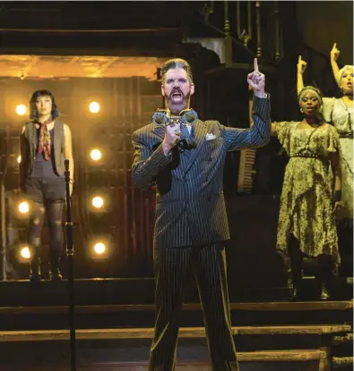  ?? T CHARLES ERICKSON ?? Matthew Patrick Quinn as Hades, with Amaya Braganza — Eurydice — at background left.