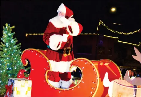  ?? ?? Santa Clause ushered in the Christmas season on Monday evening at the Starkville Christmas Parade. For more pictures, see page 3. (Photos by Cal Brown, SDN)