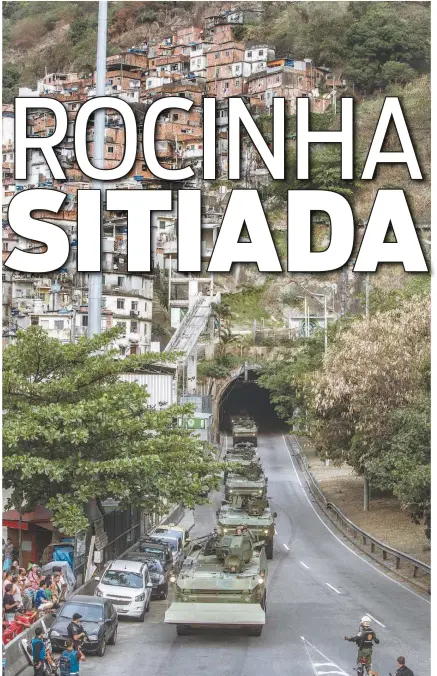  ?? MARCIO MERCANTE/AGENCIA O DIA ?? A chegada das Forças Armadas na Rocinha, com blindados, voltou a fechar o trânsito da auto-estrada Lagoa-Barra ontem à tarde
