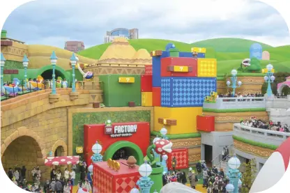  ?? ?? The Super Nintendo World in Universal Studios Japan showcases an attraction referencin­g popular figures from the renowned gaming franchise Super Mario