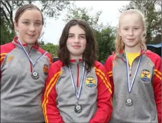  ??  ?? St Kearns Under 14 girls team, Aoibhe Colfer, Robyn Roche and Eve Cahill.