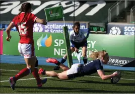  ??  ?? Megan Gaffney scores Scotland’s first try at Scotstoun