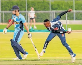  ?? Picture: BERNARD MACKENZIE ?? SUPERB SPELL: Graeme bowler Sihle Mginywa sends down a delivery during their cricket match against St Andrew’s in the Shaw-Brown Trophy in Grahamstow­n on Friday. The non-striker is Dylan Wilson