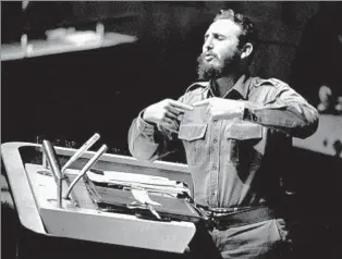  ?? AP ?? RIVETING THE U.N. Castro addresses the United Nations in September 1960. The new leader emerged as the star attraction, despite a speech that passed four hours and U.S. efforts to isolate him.