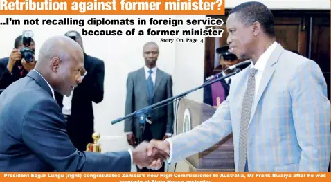  ??  ?? President Edgar Lungu (right) congratula­tes Zambia’s new High Commission­er to Australia, Mr Frank Bwalya after he was sworn-in at State House yesterday