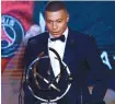 ?? AFP-Yonhap ?? Kylian Mbappe delivers a speech after receiving the Best Players Ligue 1 Award, in Paris, Monday.