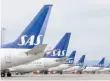  ?? — AFP ?? Scandinavi­an airline SAS aircrafts are parked at Terminal 4 at Arlanda Airport in Stockholm, Sweden.