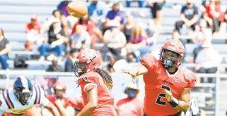  ?? MIKE CAUDILL/FREELANCE ?? Salem quarterbac­k Saquan Miles, right, throws a pass during the first half of the SunDevils’ 20-7 home loss to Maury in a Class 5 Region A semifinal Saturday.