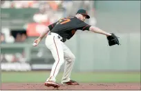  ?? Lachlan Cunningham
/ Getty Images /TNS ?? Alex Wood of the San Francisco Giants pitches in the first inning against the Atlanta Braves at Oracle Park on Saturday in San Francisco.the Giants blanked the Braves, 2-0.