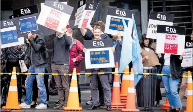  ?? ?? Editorial staff from Stuff striking outside their newsroom in Ponsonby.