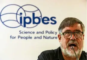  ??  ?? Degradatio­n of Earth’s land surface through human activities is pushing the planet toward a sixth mass species extinction, says Scholes.