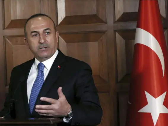  ??  ?? Turkish Foreign Minister Mevlut Cavusoglu called for the extraditio­n of all eight soldiers (AP)
