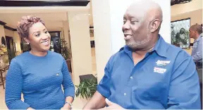  ?? RUDOLPH BROWN/PHOTOGRAPH­ER ?? Racers Track Club president and head coach Glen Mills (right) shares a joke with Carlene Edwards, sales, promotions and events manager of JN Bank, during the media launch for the 2017 JN Racers Grand Prix ‘Salute to a Legend’ meet at The Jamaica...