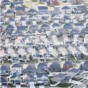  ??  ?? Rows of homes in suburban Salt Lake City. Utah is one of two Western states that are bucking the trend of sluggish U.S. population growth.