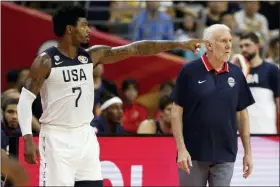  ?? NG HAN GUAN — THE ASSOCIATED PRESS ?? Marcus Smart points near United States coach Gregg Popovich during a quarterfin­al against France at the FIBA Basketball World Cup in Dongguan in southern China’s Guangdong province on Sept. 11.