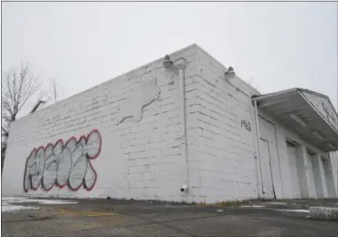  ?? MORNING JOURNAL FILE ?? Recent graffiti taggings have popped up in Lorain—including on a piece of vacant commercial property, at 1463 Broadway Ave.—which is listed to Hemminger Family Trust, according to the Lorain County Auditor’s website.