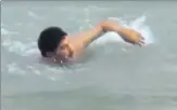  ??  ?? A grab of a video showing Haryana BJP president Subhash Barala swimming in a canal in Fatehabad district.