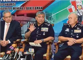  ??  ?? (From left) Deputy chief executive officer of Telekom Malaysia Bhd Datuk Bazlan Osman, Inspector-General of Police Tan Sri Khalid Abu Bakar and federal police Criminal Investigat­ion Department director Datuk Seri Mohmad Salleh at the Op Selamat awards...