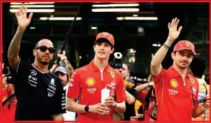  ?? ?? WAVE GOODBYE: Hamilton (left) will be joining Leclerc (right) at Ferrari