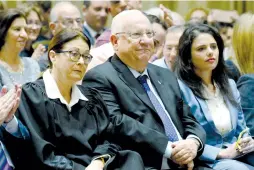  ?? (Mark Neiman/GPO) ?? SUPREME COURT President Esther Hayut (left) sits next to President Reuven Rivlin and Justice Minister Ayelet Shaked at the President’s Residence in Jerusalem yesterday.