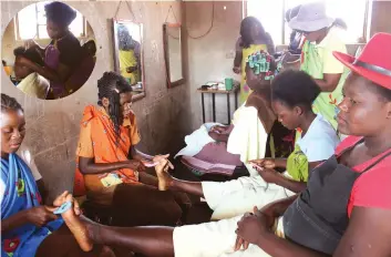  ??  ?? Women of Machoka Village, Chiredzi, learn life skills and 16-year-old Yvette Sigauke (Inset), who dropped out of formal school due to fees challenges, sees the programme as an opportunit­y to put her life back on track