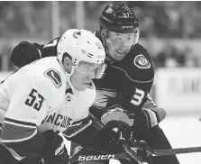  ?? GETTY IMAGES ?? Nick Ritchie, right, signed a three-year deal with the Anaheim Ducks after sitting out the first seven games. He was in much the same situation as the Leafs’ William Nylander, who remains unsigned.