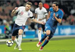  ?? Picture: REUTERS ?? INTERNATIO­NAL FRIENDLY: England’s Adam Lallana, left, in action with Italy’s Mattia De Sciglio