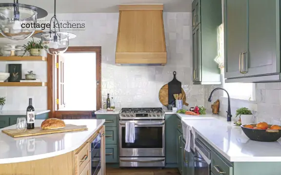  ?? ?? Wood creates a sense of timelessne­ss in Valerie’s design and ties in with the Craftsman style of the cottage. The custom hood, floating shelves and island are all made of rift-sawn white oak.