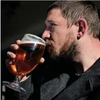  ??  ?? ●● A punter supping his first pint of Stella at 9am. The Regal Moon, Rochdale.