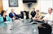  ?? Fresno County Sheriff’s Office ?? FRESNO COUNTY sheriff’s officials discuss efforts to recover the two crash victims’ bodies with their families and officials from the Thai Consulate.