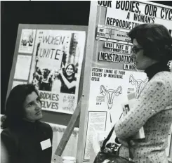  ??  ?? An early 1970s exhibit booth for Our Bodies, Ourselves. This influentia­l book about women’s health is the subject of a new radio documentar­y