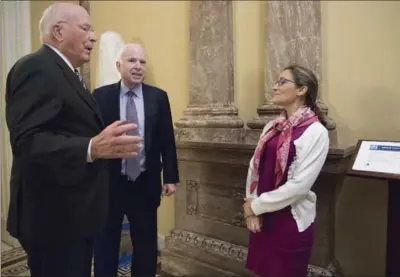  ?? J. SCOTT APPLEWHITE, THE ASSOCIATED PRESS ?? Sen. Patrick Leahy, left, and Senate Armed Services Committee chair Sen. John McCain talk with Foreign Affairs Minister Chrystia Freeland.