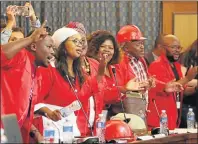  ??  ?? IN HIGH SPIRITS: EFF councillor­s, from left, Zilindile Vena, Yoliswa Yako, Phumza Tshanga (partially obscured), Thozama Mhlongo, Lukhanyo Mrara and Simphiwe Ntshiza at the council meeting