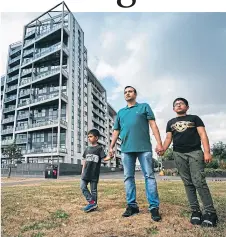  ?? Picture Andrew Cawley ?? Abhijeet Kadwe with his two sons, Kiaan, five, and Advay, eight, at their former apartment family home in Glasgow