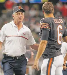  ??  ?? John Fox has gone from Jay Cutler ( left, in 2016) at quarterbac­k to Mike Glennon, who was benched after four games in 2017.